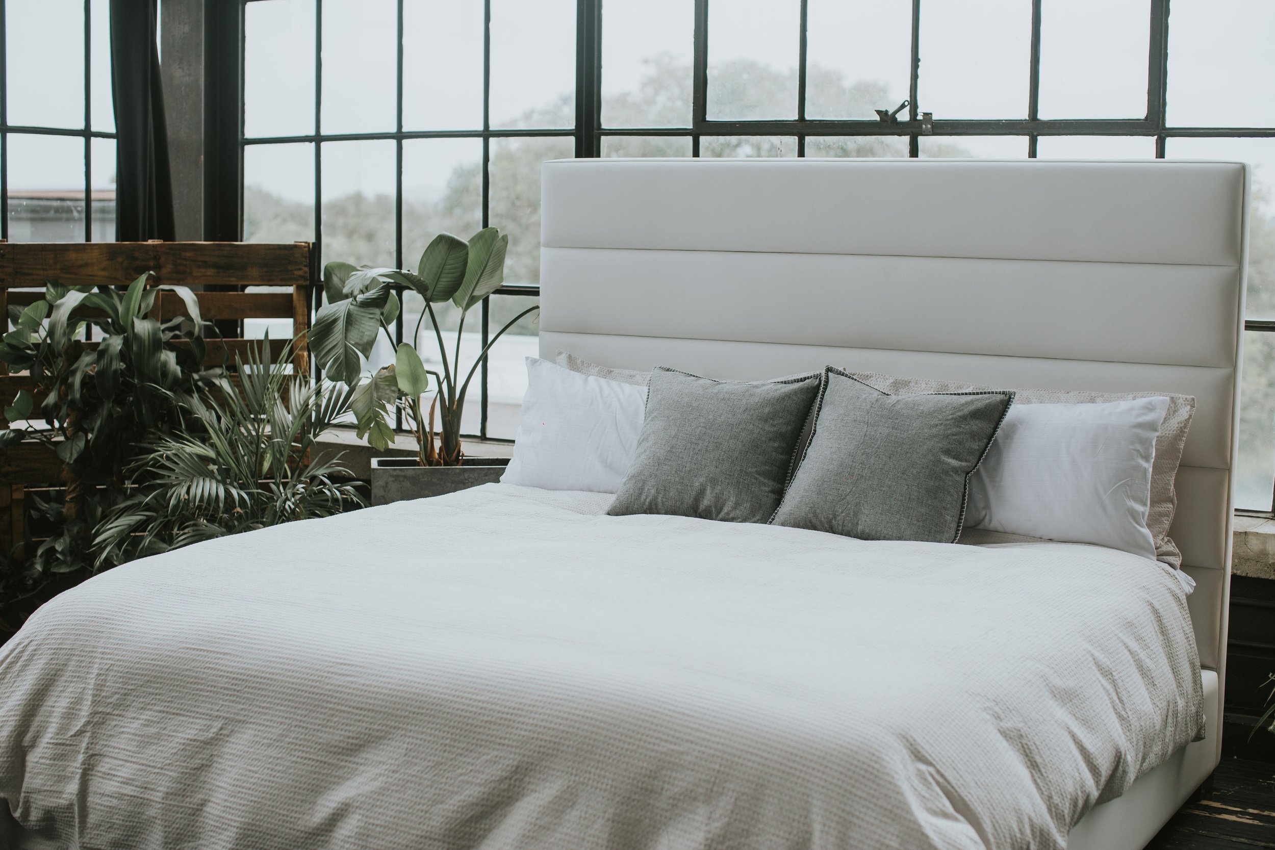 Zazen Bed — white vegan leather, horizontal channel headboard
